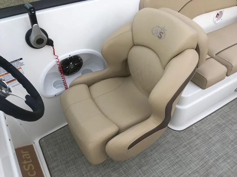 Slide: The Image of Captain's chair on 2023 NauticStar 223DC Sport Deck boat, beige upholstery. - 20