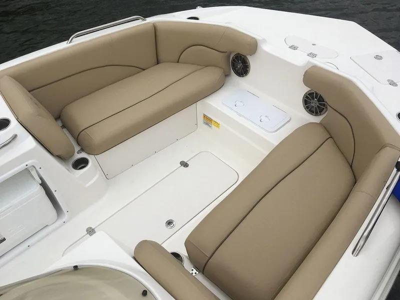 Slide: The Image of 2023 NauticStar 203SC Sport Deck boat interior with tan seating. - 8