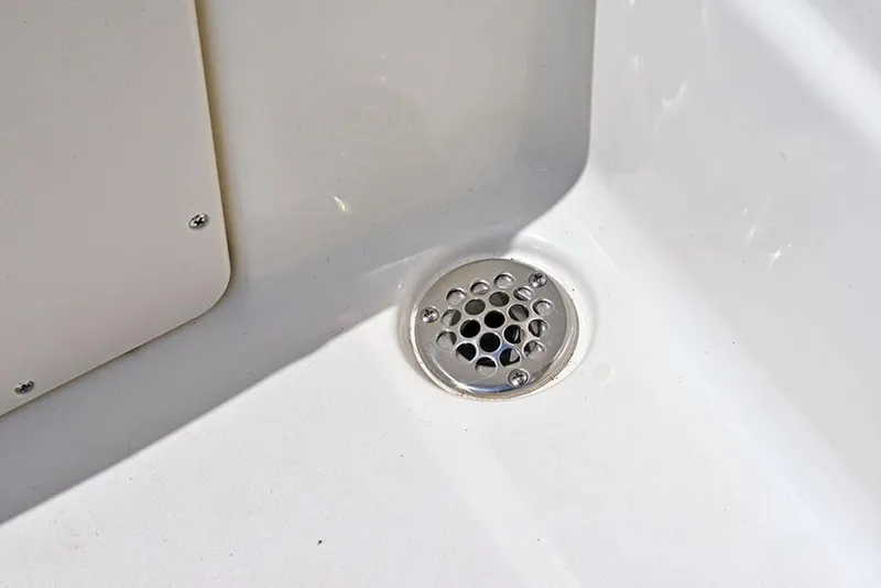 Slide: The Image of Close-up of a drain on a 2023 NauticStar 193 Side Console boat. - 21