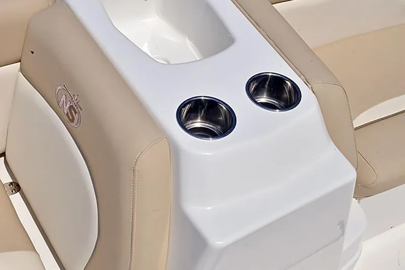 Slide: The Image of 2023 NauticStar 193 Side Console boat interior with cup holders and storage. - 26