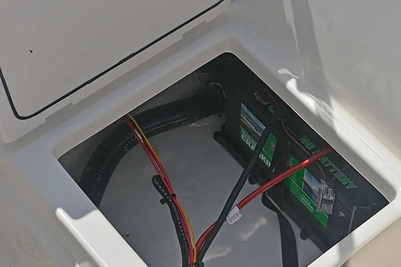 Slide: The Image of Battery compartment of 2023 NauticStar 193 Side Console boat. - 27