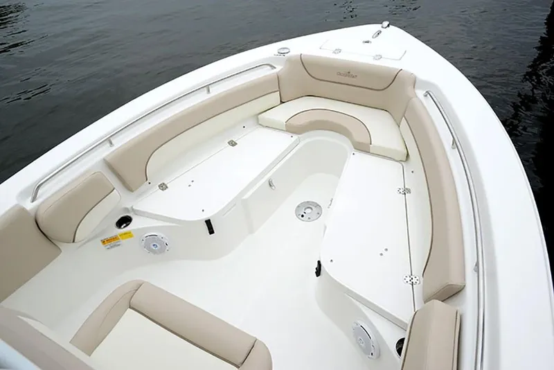 Slide: The Image of 2023 NauticStar 2302 Legacy boat interior with cushioned seating. - 22