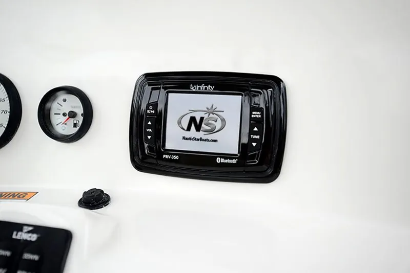 Slide: The Image of Infinity PKW350 Bluetooth stereo system on 2023 NauticStar 2302 Legacy boat dashboard. - 35