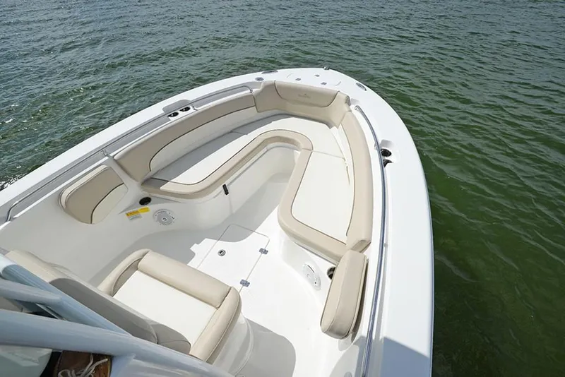 Slide: The Image of 2023 NauticStar 2602 Legacy boat with spacious seating on the water. - 18