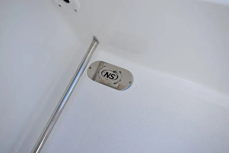 Slide: The Image of 2023 NauticStar 2602 Legacy boat interior detail with NS logo. - 30