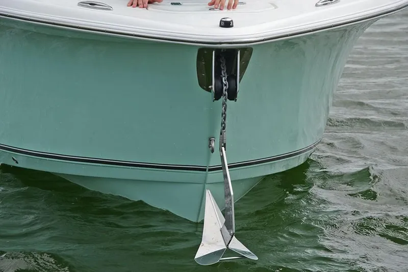Slide: The Image of 2023 NauticStar 2602 Legacy boat with anchor in water. - 8