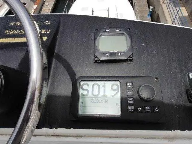 Slide: The Image of Control panel of a 2004 Riviera 58 Enclosed Flybridge yacht. - 18