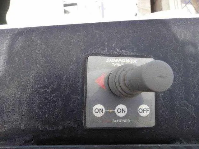 Slide: The Image of 2004 Riviera 58 Enclosed Flybridge Sidepower thruster control panel - 19