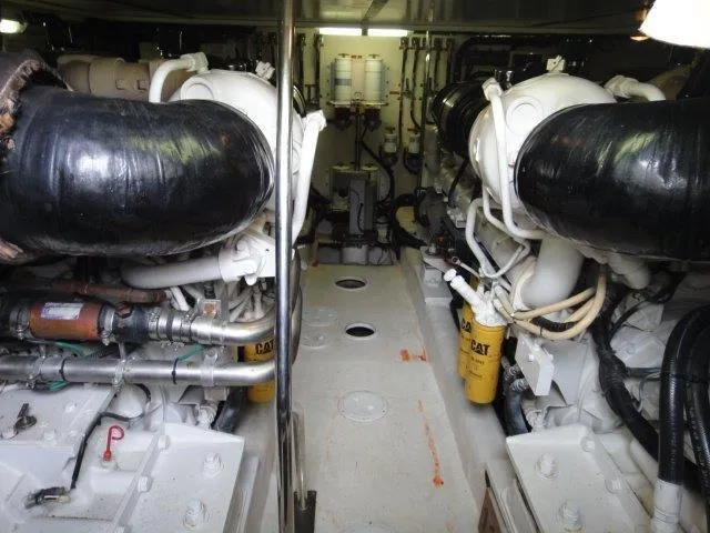 Slide: The Image of Engine room of a 2004 Riviera 58 Enclosed Flybridge yacht. - 44