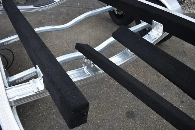 Slide: The Image of Yacht Club Trailers 21-6000 Aluminum tandem axle bunk boat trailer 2026 - 8