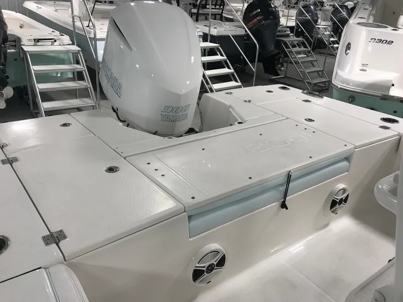 Slide: The Image of 2024 Robalo 246 Cayman Sky Deck boat with Yamaha outboard motor. - 12
