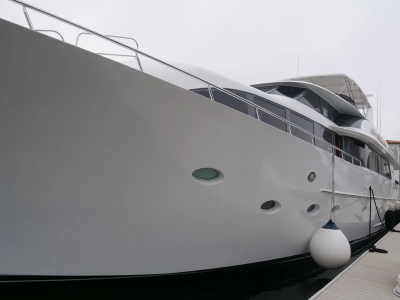 Slide: The Image of Luxury yacht Westport 112, 2000 model, docked at a marina. - 3