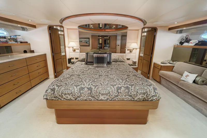 Slide: The Image of Luxurious master bedroom on a 2000 Westport 112 yacht with elegant decor. - 30