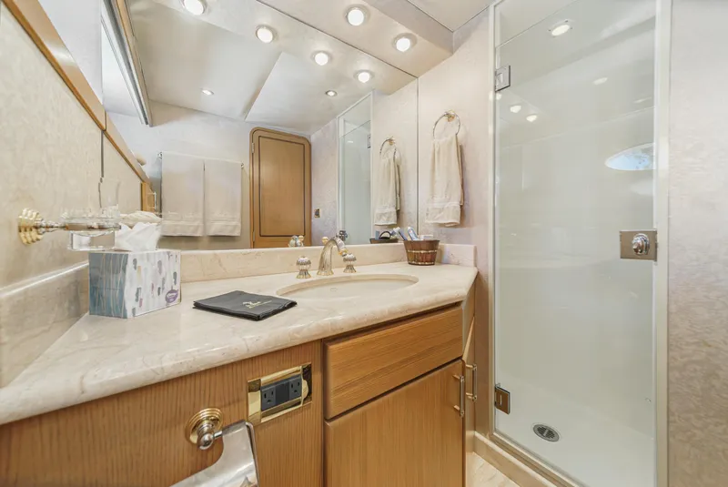 Slide: The Image of Luxurious bathroom in a 2000 Westport 112 yacht with modern amenities. - 31