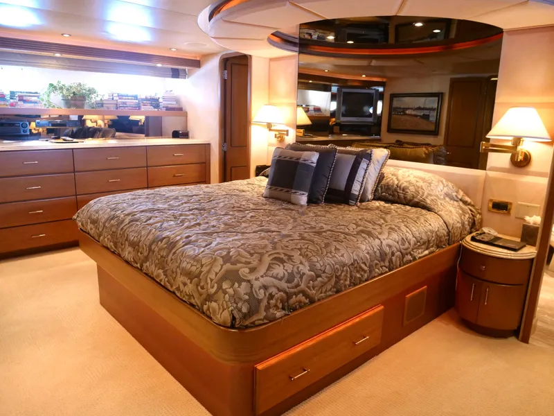 Slide: The Image of Luxurious bedroom in a 2000 Westport 112 yacht with elegant decor. - 35