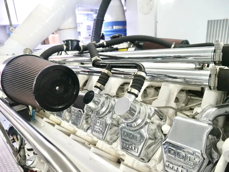 Slide: The Image of Close-up of a 2000 Westport 112 engine with chrome details and air filter. - 42