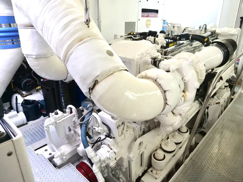 Slide: The Image of Engine room of a 2000 Westport 112 yacht with insulated pipes and machinery. - 44