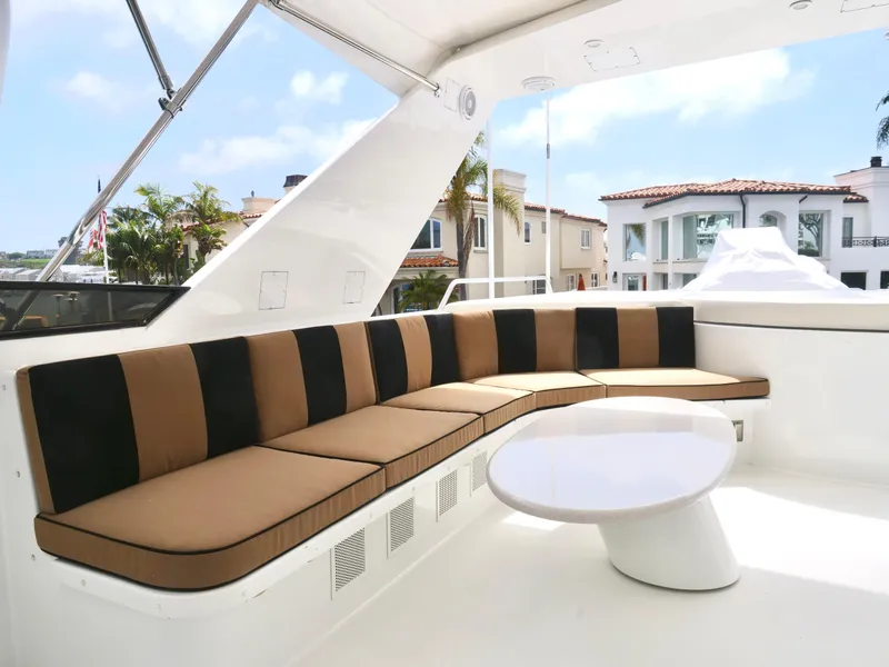 Slide: The Image of Luxurious seating area on a 2000 Westport 112 yacht with modern decor. - 47