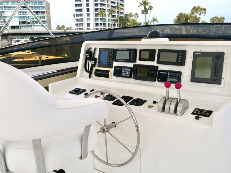Slide: The Image of Helm station of 2000 Westport 112 yacht with navigation equipment and controls. - 9