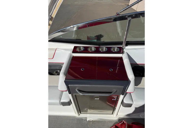 Slide: The Image of 2019 Formula 330 Crossover Bowrider with open drawer and stainless steel handle. - 12