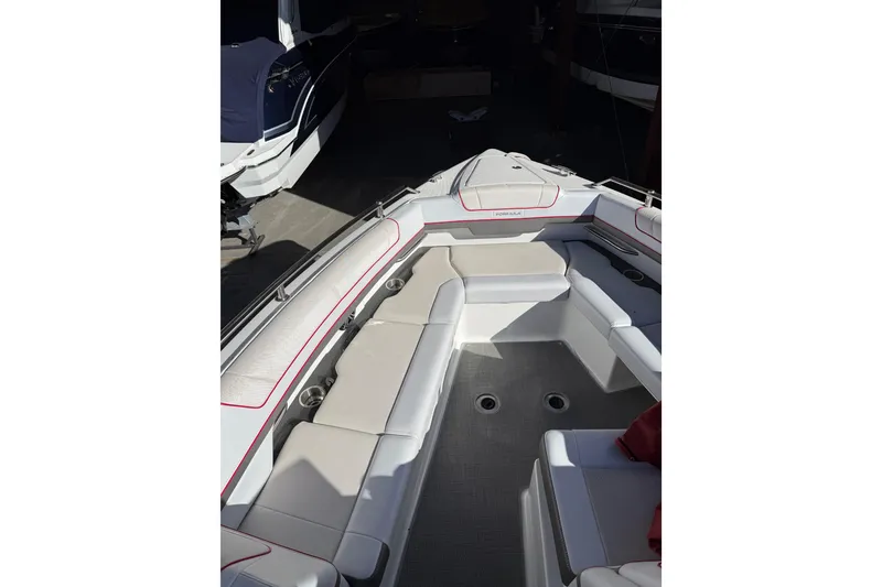 Slide: The Image of 2019 Formula 330 Crossover Bowrider interior with sleek seating and modern design. - 9