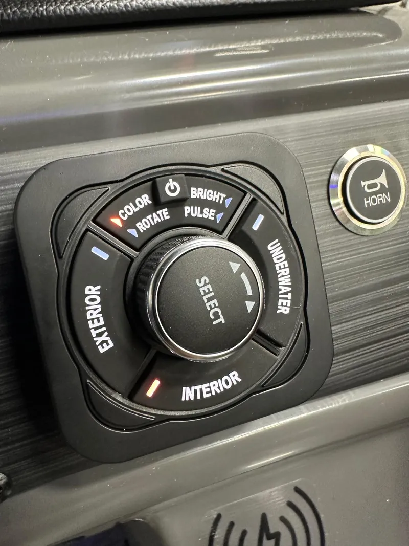 Slide: The Image of Control panel of 2025 Bennington 21 SSR Quad Bench, featuring lighting and horn options. - 11