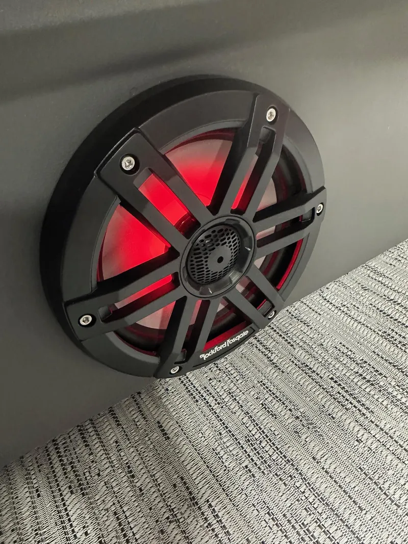 Slide: The Image of Red illuminated speaker on 2025 Bennington 21 SSR Quad Bench boat. - 28