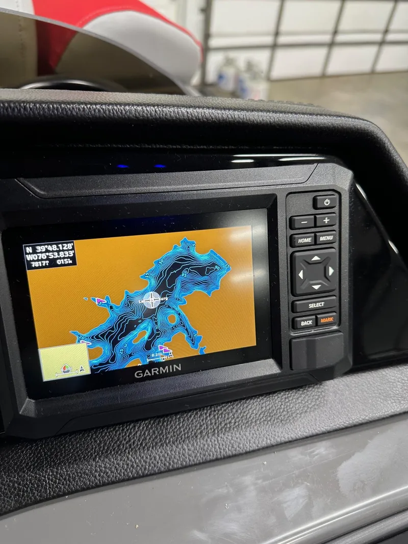 Slide: The Image of Garmin navigation system on 2025 Bennington 21 SSR Quad Bench boat dashboard. - 30
