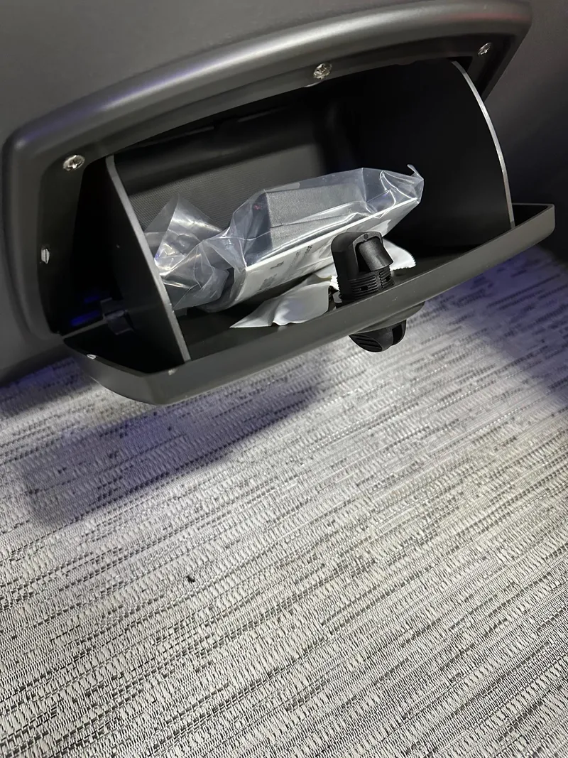 Slide: The Image of Storage compartment in 2025 Bennington 21 SSR Quad Bench boat, featuring interior accessories. - 31