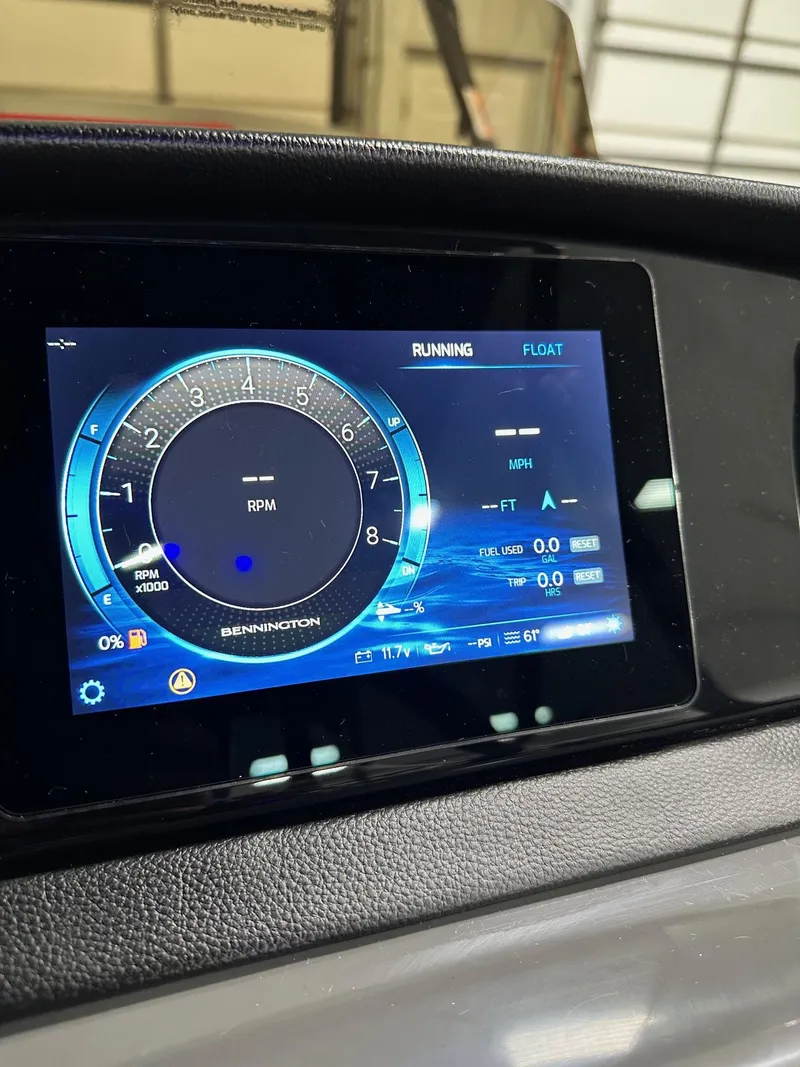 Slide: The Image of Dashboard display of 2025 Bennington 21 SSR Quad Bench, showing RPM and other metrics. - 9