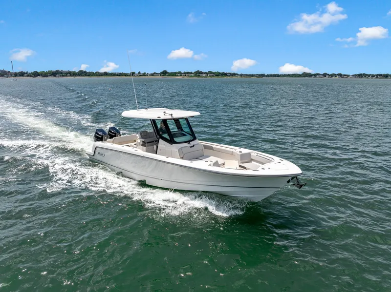 Slide: The Image of Boston Whaler 330 Outrage 2026 - 2