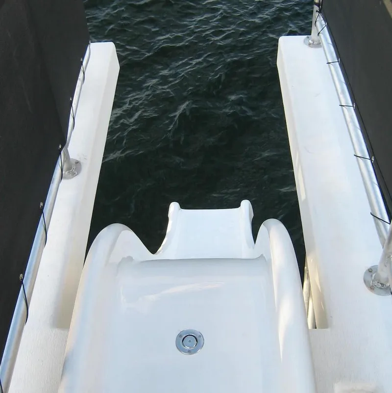 Slide: The Image of 2009 Sumerset Stargazer Trip 10 boat slide leading into water. - 20