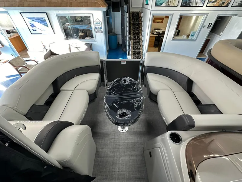 Slide: The Image of Interior of 2025 Sylvan Mirage 8520 CLZ DH pontoon boat with plush seating. - 14