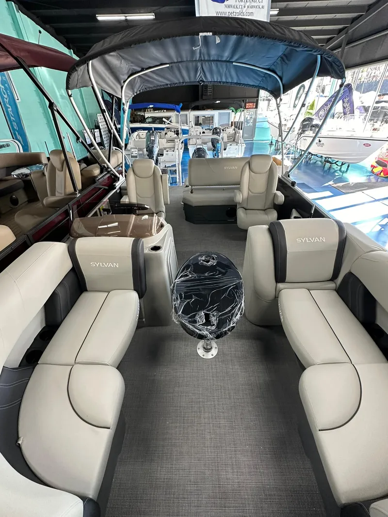 Slide: The Image of 2025 Sylvan Mirage 8520 CLZ DH pontoon boat with spacious seating and canopy. - 16