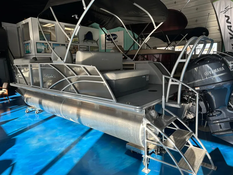 Slide: The Image of 2025 Sylvan Mirage 8520 CLZ DH pontoon boat with Yamaha engine in showroom. - 4