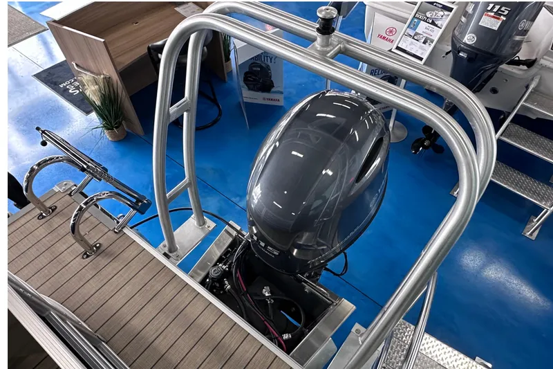 Slide: The Image of 2026 Sylvan Mirage 8522 LZ boat with Yamaha outboard motor on display. - 6
