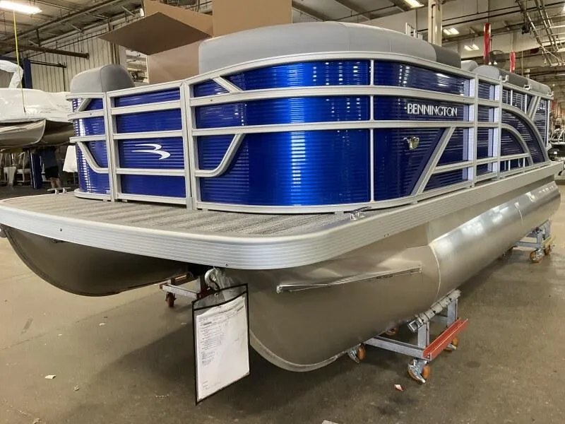 Slide: The Image of 2025 Bennington 168 SL pontoon boat in stock, featuring sleek blue design. - 34