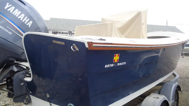 Slide: The Image of 2008 Roth Bilt 21 Classic boat with Yamaha engine on trailer. - 2