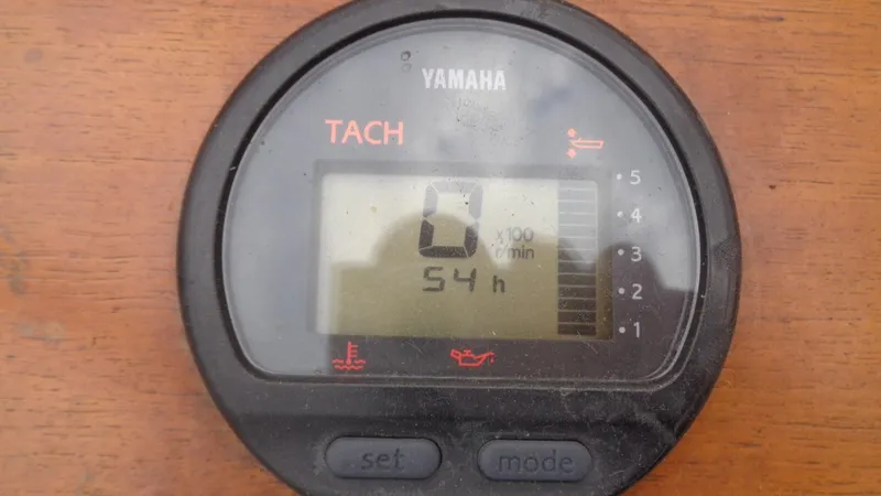 Slide: The Image of Yamaha tachometer displaying 54 hours on a Roth Bilt 21 Classic, 2008 model. - 9