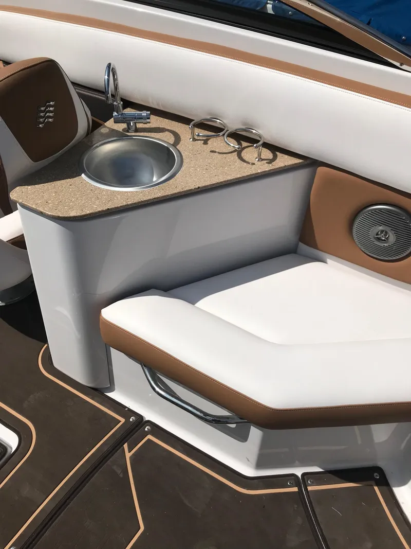Slide: The Image of Luxurious seating area on a 2019 Four Winns HD270 boat. - 15