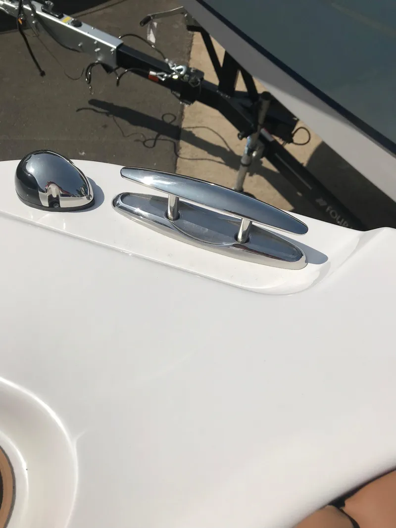 Slide: The Image of Close-up of 2019 Four Winns HD270 boat deck with stainless steel fittings. - 25