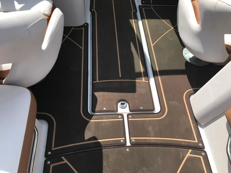 Slide: The Image of Interior of a 2019 Four Winns HD270 boat with stylish flooring. - 29