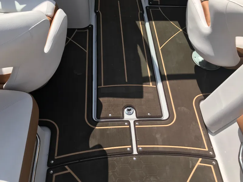 Slide: The Image of Interior of a 2019 Four Winns HD270 boat with stylish flooring. - 30