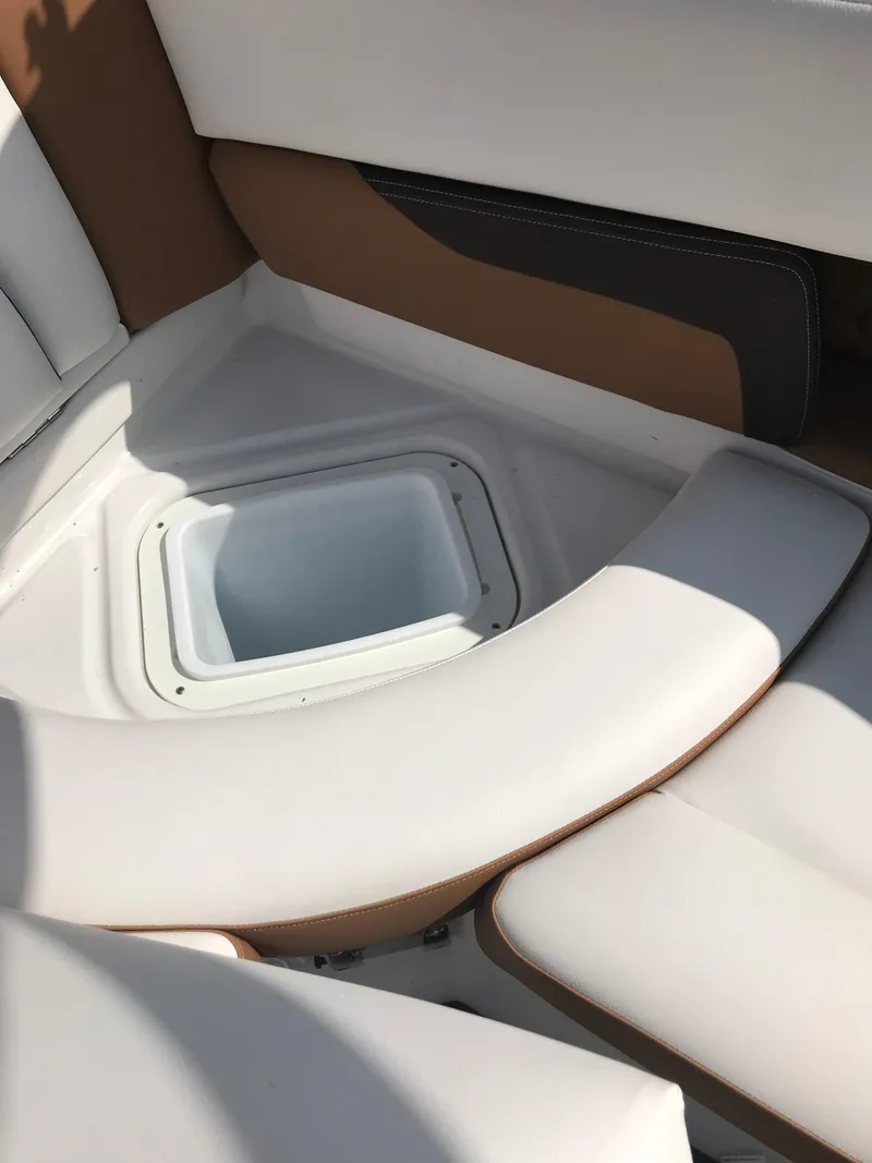 Slide: The Image of Interior of a 2019 Four Winns HD270 boat with seating area. - 35