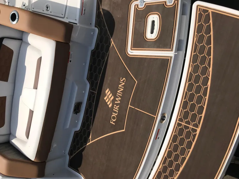 Slide: The Image of 2019 Four Winns HD270 boat with stylish deck design. - 37