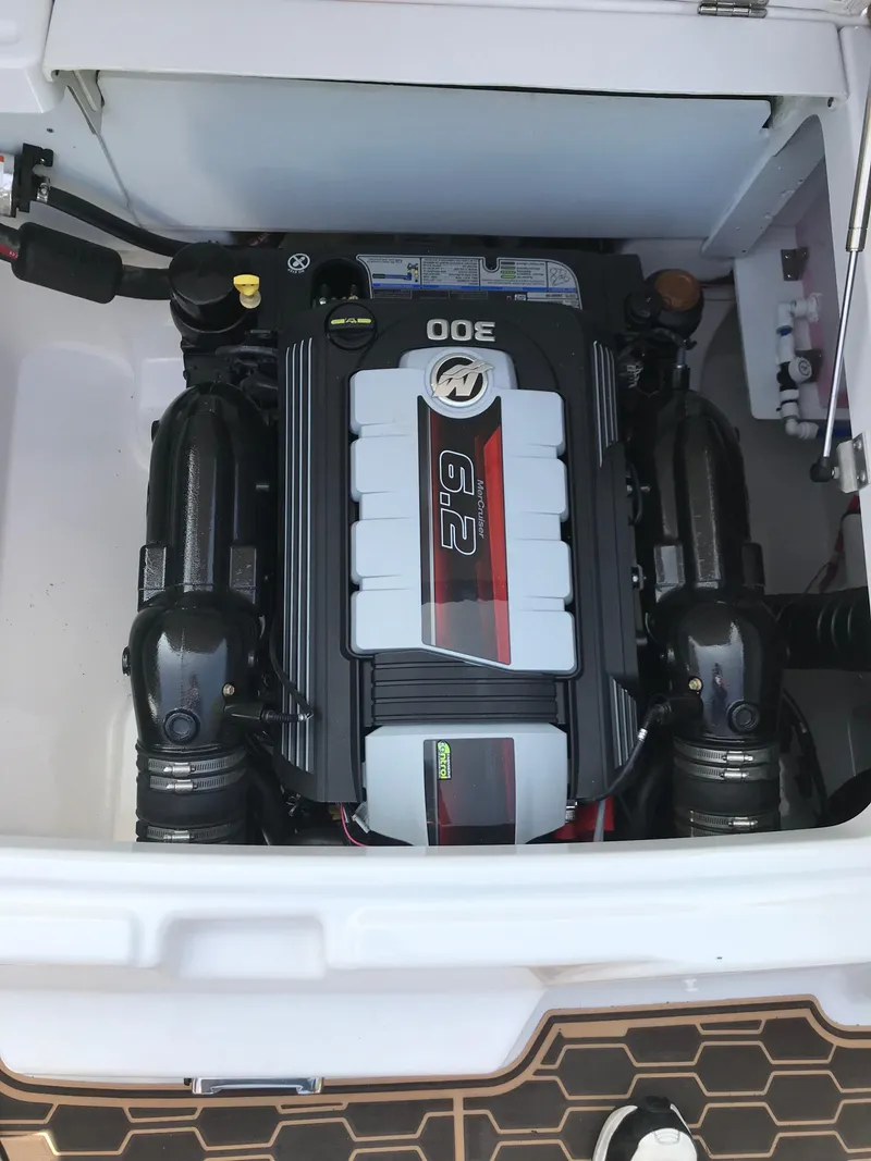 Slide: The Image of Engine compartment of a 2019 Four Winns HD270 boat with 6.2L engine. - 41