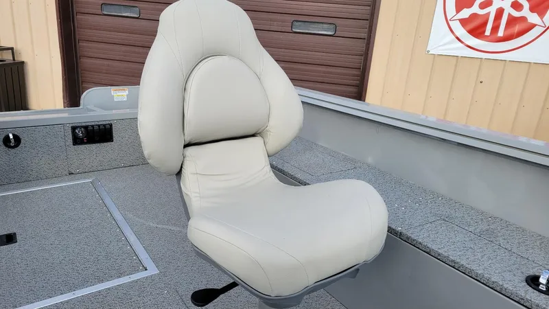 Slide: The Image of Comfortable seat in 2023 Smoker Craft Freedom 16 boat, featuring a Yamaha F25LWHC engine. - 20