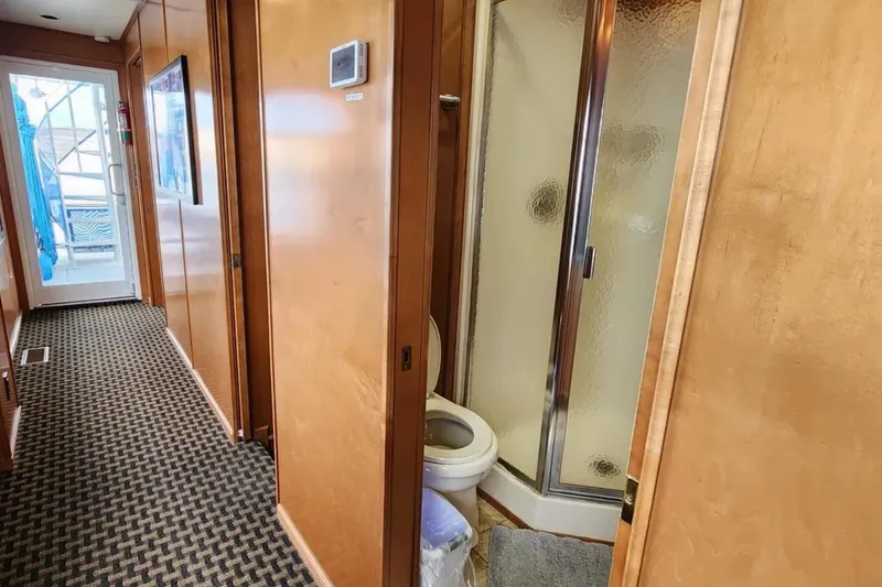 Slide: The Image of Hallway view of 2008 Sumerset Blue Moon Trip #11, featuring a bathroom with shower. - 17