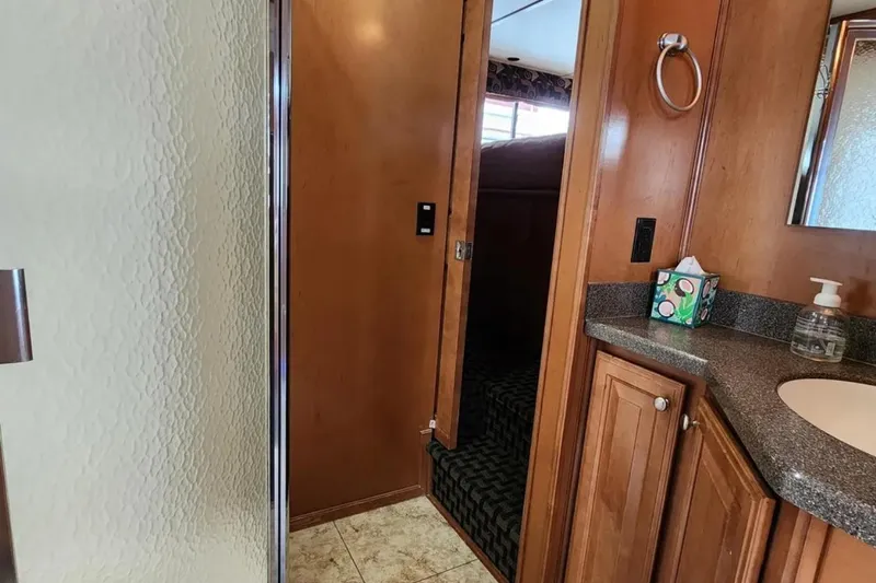 Slide: The Image of Interior of 2008 Sumerset Blue Moon Trip #11, featuring bathroom and hallway. - 18