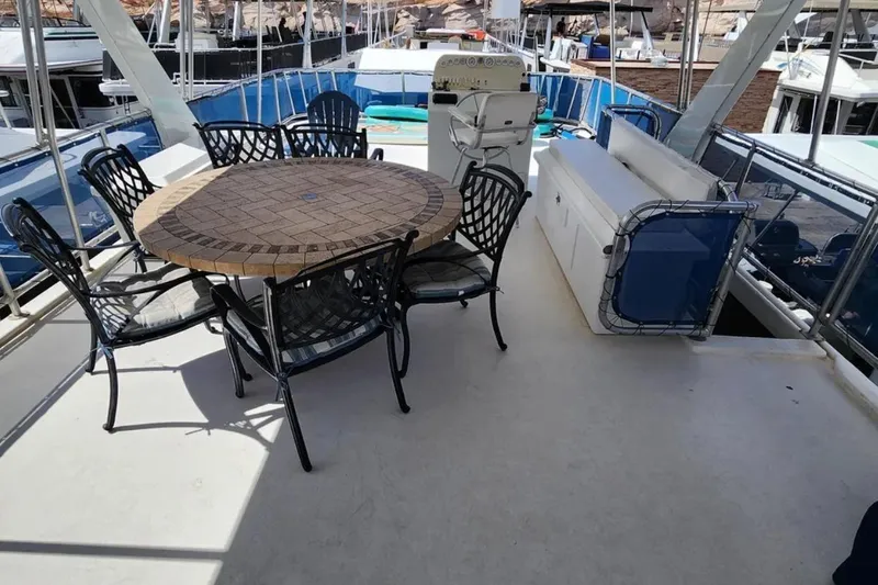 Slide: The Image of Upper deck of 2008 Sumerset Blue Moon Trip #11 with table and chairs. - 25